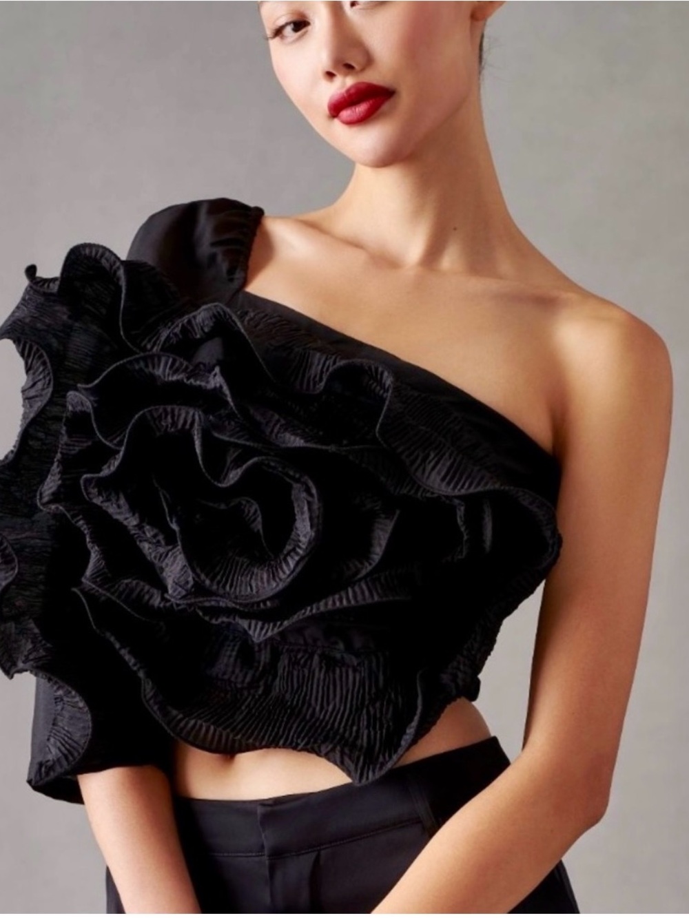 Black One-Shoulder Ruffle Crop Top with Sculpted Floral Detail